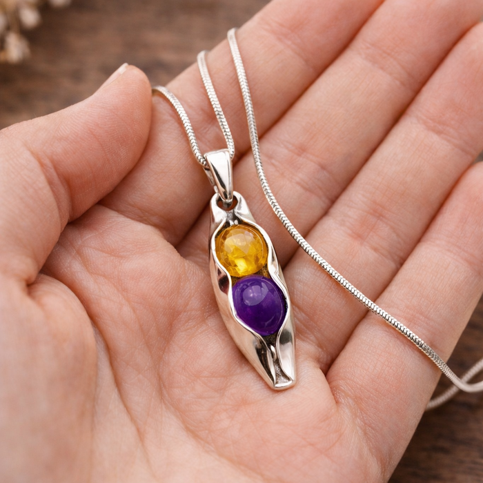 birthstones necklace in hand
