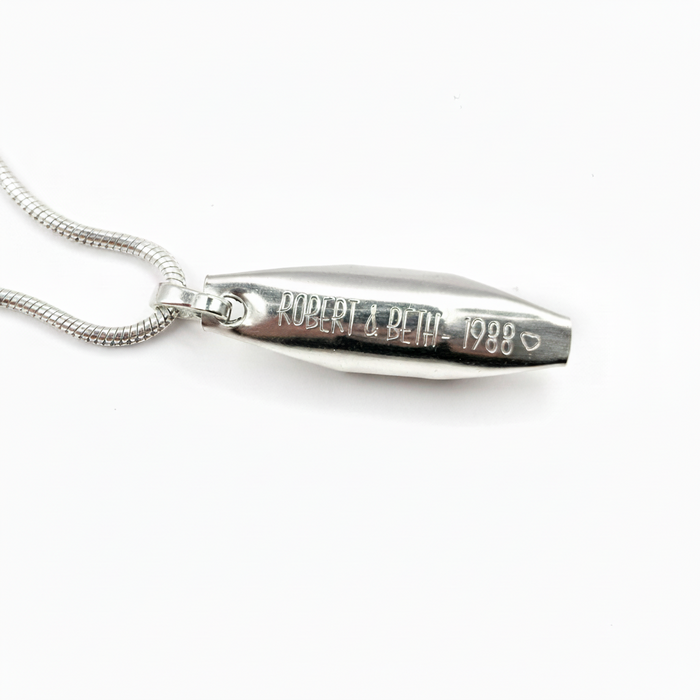 Engraving on the back of the pod