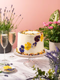 Elderflower and Rose Garden Cake decorated with pressed edible flowers and petals