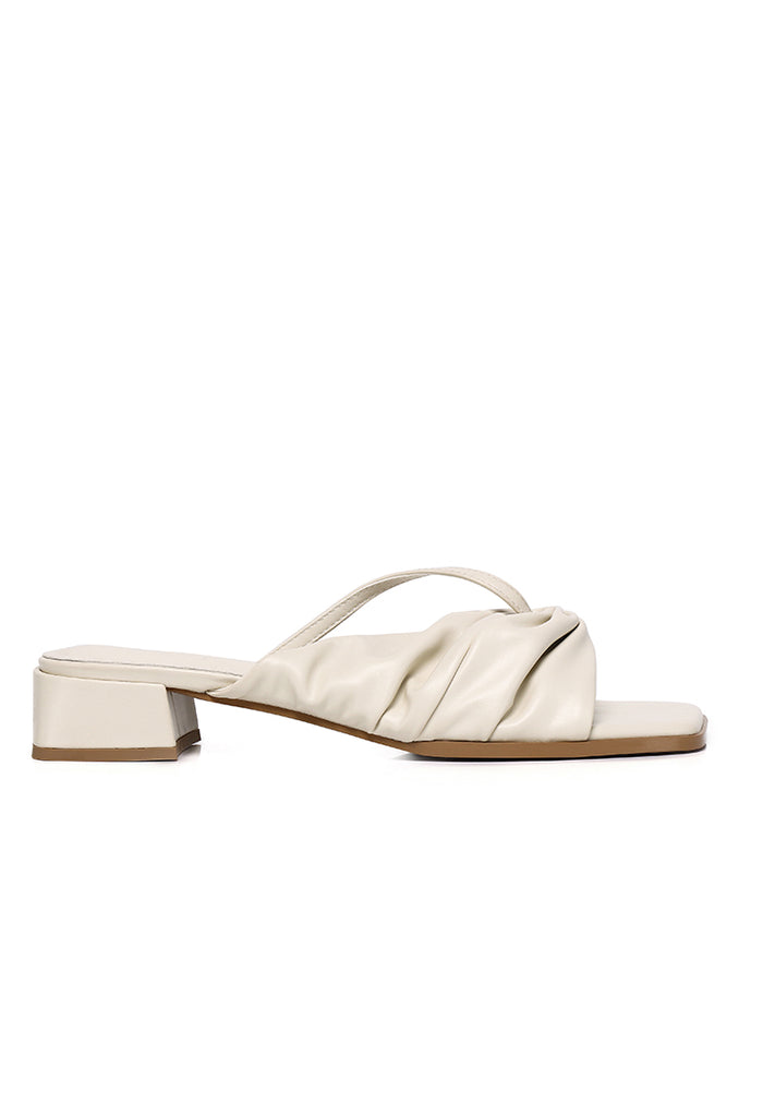 Hunera Asymmetric Pleated Low Heels Sandals (Cream)