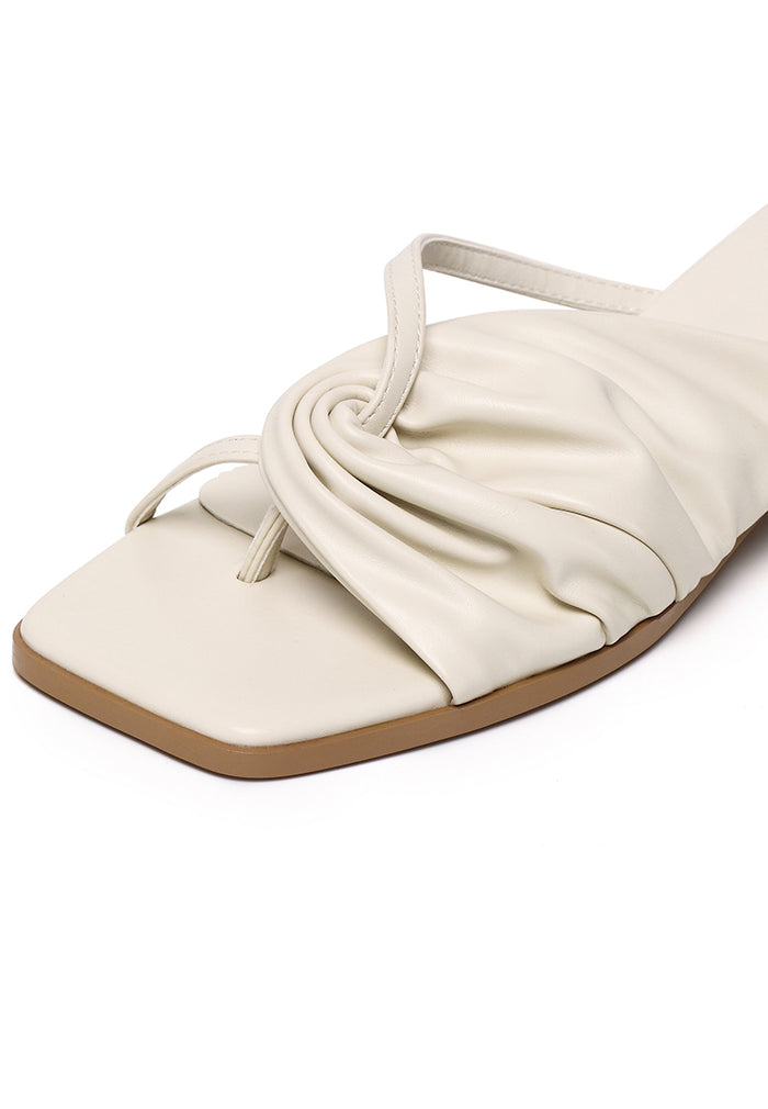 Hunera Asymmetric Pleated Low Heels Sandals (Cream)