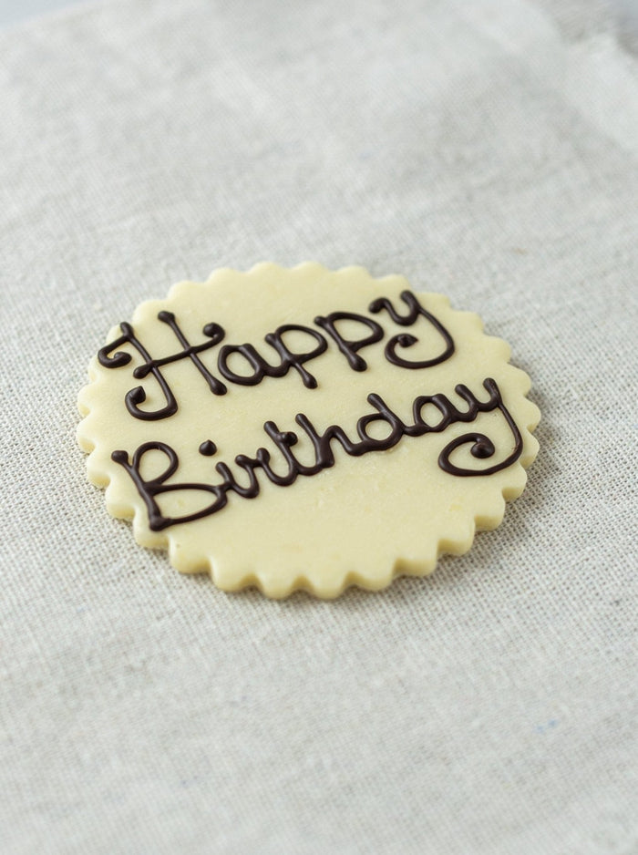 Patisserie Valerie's handmade Inscription cake delivery